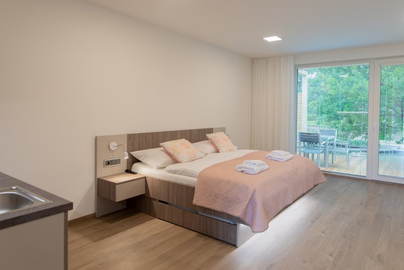 Apartmány u rybníka